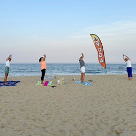 crescent moon pose at sunset yoga