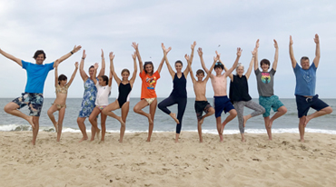 yoga with family and friends on the beach