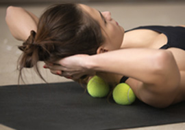 yoga therapy with tennis balls